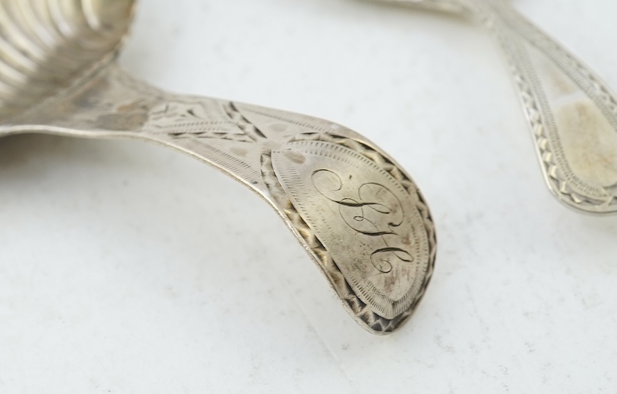 Ten assorted mainly 19th century silver and white metal caddy spoons, with shell or fluted bowls
